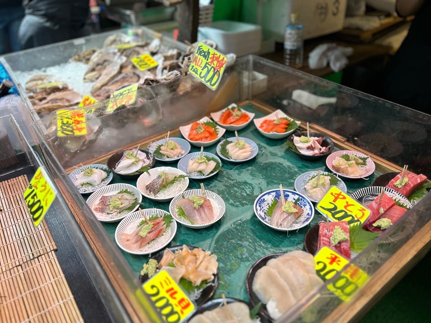 Private Toyosu & Tsukiji Market Adventure with Tuna Auction - Market shopping that makes sense: knives, matcha tools, pottery