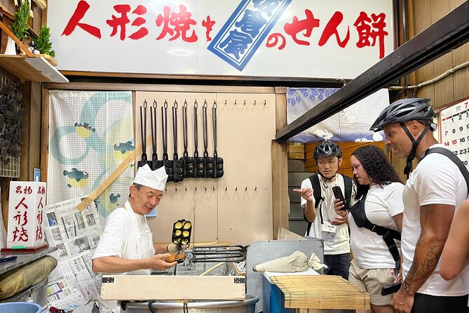 Tokyo Top Highlights 3h Guided E-bike Tour - Tokyo City Route stops: Tokyo Station, doll-street sweets, and a calm garden